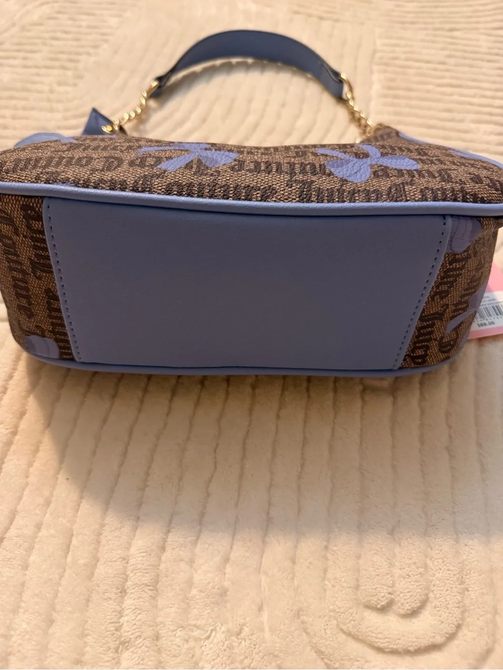 Juicy Couture Brown Monogram Shoulder Bag with Blue Bow Accents